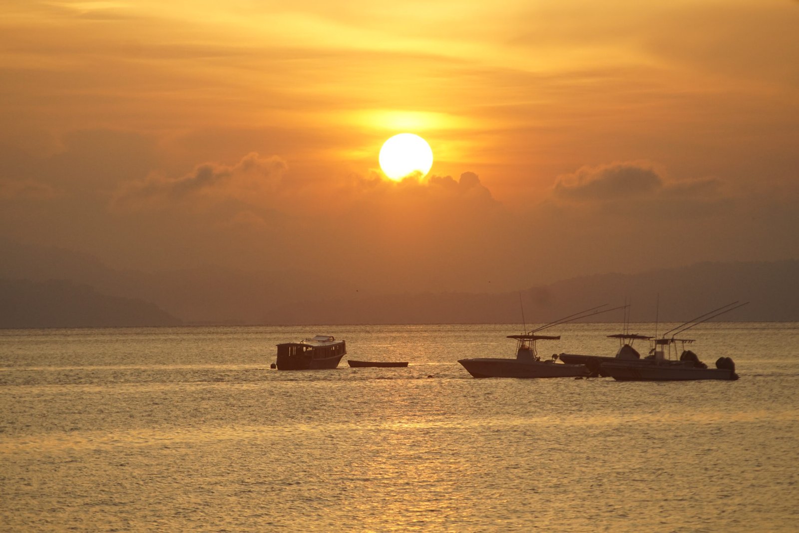 Fishing charter boats at sunrise. Osa peninsula Costa Rica
