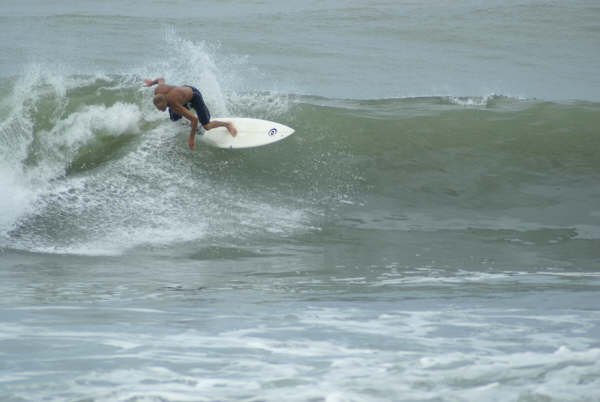 riding the break . Osa Peninsula Costa rica